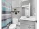 Neutral bathroom featuring gray walls, a shower with stylish curtains, and modern fixtures at 467 Hidden Meadow Ln, Summerville, SC 29486