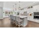 Open concept kitchen with an island, barstool seating, pendant lighting, and an adjacent dining area at 467 Hidden Meadow Ln, Summerville, SC 29486