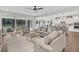 Spacious living room showcases the open-plan design with seamless flow to the kitchen and outdoor patio at 467 Hidden Meadow Ln, Summerville, SC 29486