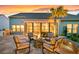 Cozy patio featuring a fire pit, comfortable seating, and easy access to the home's interior at 467 Hidden Meadow Ln, Summerville, SC 29486
