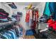 Organized walk-in closet with wire shelving, hanging clothes, and ample storage space for clothing and accessories at 4801 Shady Tree Ln, Summerville, SC 29485