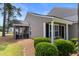 The side of this house features a screened-in porch perfect for relaxing outdoors at 4801 Shady Tree Ln, Summerville, SC 29485