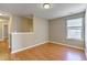 Bright bedroom with hardwood floors and a large window at 4936 Ballantine Dr, Summerville, SC 29485