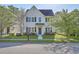 Charming two-story home with landscaped front yard and well-manicured lawn at 4936 Ballantine Dr, Summerville, SC 29485