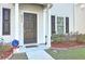Close-up view of the home's front door and well-maintained landscaping at 4936 Ballantine Dr, Summerville, SC 29485