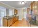 Another view of the kitchen featuring stainless steel appliances and hardwood floors at 4936 Ballantine Dr, Summerville, SC 29485