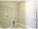 Laundry room with tile floor, storage shelf, and washing machine hookups at 4936 Ballantine Dr, Summerville, SC 29485