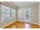 Bright sunroom with hardwood floors and access to outdoor area at 4936 Ballantine Dr, Summerville, SC 29485