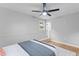Well-lit bedroom featuring a comfortable queen-sized bed, natural light, and ample space at 4965 Foxwood Dr, North Charleston, SC 29418