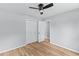 Neat bedroom featuring wood floors, and a double door closet at 4965 Foxwood Dr, North Charleston, SC 29418