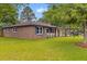 Charming brick home with a well-manicured lawn and inviting curb appeal at 4965 Foxwood Dr, North Charleston, SC 29418
