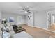 Cozy living room features a gray sectional, wood floors, and stylish decor at 4965 Foxwood Dr, North Charleston, SC 29418