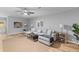 Comfortable living room showcases a gray sectional, coffee table, and modern lighting at 4965 Foxwood Dr, North Charleston, SC 29418