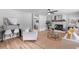 Bright living room with hardwood floors, a fireplace, and comfortable seating for entertaining at 4965 Foxwood Dr, North Charleston, SC 29418