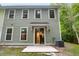Back exterior of the home showing the patio with sliding glass door entry, siding, and air conditioning unit at 5001 Hay Bale Ct, Summerville, SC 29485
