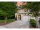 Beautiful two-story home with well-manicured lawn, landscaping and a two-car garage at 5001 Hay Bale Ct, Summerville, SC 29485