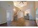 Bright and airy living space with a staircase, open kitchen, and views to other rooms creating a connected and inviting home at 5001 Hay Bale Ct, Summerville, SC 29485