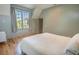Bedroom with wood floors, neutral walls, white ceiling, and a neutral bed frame at 515 Claret Way, Kiawah Island, SC 29455