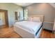 Main bedroom features a sleek bed frame and natural light at 515 Claret Way, Kiawah Island, SC 29455