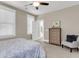 Bright bedroom with natural light, carpet flooring, and a dresser at 525 Scholar Way, Summerville, SC 29486