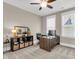 Comfortable home office with a large desk, comfortable seating, and ample natural light at 525 Scholar Way, Summerville, SC 29486