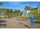 Neighborhood playground with swings and play equipment, set against a backdrop of colorful homes at 525 Scholar Way, Summerville, SC 29486