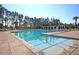 Sparkling community pool with clear water and ample deck space, providing a refreshing oasis for residents at 525 Scholar Way, Summerville, SC 29486