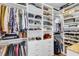 Organized walk-in closet featuring built-in shelving, drawers, and hanging rods for efficient storage at 525 Scholar Way, Summerville, SC 29486