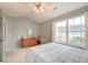 Bedroom with carpet, a ceiling fan, a large window, and light-gray walls at 543 Mclernon Trce, Johns Island, SC 29455