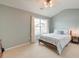 Bedroom with carpet, a ceiling fan, a large window, and light-gray walls at 543 Mclernon Trce, Johns Island, SC 29455