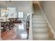 Inviting living area featuring hardwood floors, stairs, and large windows at 543 Mclernon Trce, Johns Island, SC 29455
