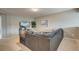 Cozy living room area with a large sectional sofa and entertainment center at 543 Mclernon Trce, Johns Island, SC 29455