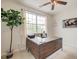Bright office space featuring a wooden desk, ceiling fan, and natural light from the window at 543 Mclernon Trce, Johns Island, SC 29455