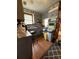 Vintage kitchen with wood floors, blue cabinets, and stainless steel sink near the window at 715 Yew St, Charleston, SC 29407