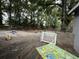 Playground with swings and a playhouse at 715 Yew St, Charleston, SC 29407