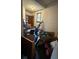 Cluttered room filled with boxes and various household items, including cleaning supplies at 715 Yew St, Charleston, SC 29407