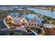 Aerial view of the community center and pool with nice landscaping, and lake views at 78 French Garden Cir, Summerville, SC 29486