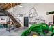 Interior view of the farm store with decorative mural, farm fresh produce display, and tractor exhibit at 78 French Garden Cir, Summerville, SC 29486