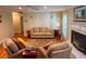 Inviting living room featuring hardwood floors, a fireplace with white mantle, and comfortable seating at 946 Law Ln, Mount Pleasant, SC 29464