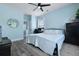 Comfortable bedroom featuring hardwood floors, light blue walls, and ample natural light at 101 Barberry St, Summerville, SC 29483