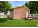 View of a small shed with well-manicured lawn, white picket fence and a picnic table at 101 Barberry St, Summerville, SC 29483