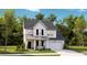 Charming two-story home featuring white siding, black shutters, and a covered front porch, nestled among mature trees at 1033 Tea Time Dr, Summerville, SC 29485
