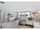 Serene main bedroom with ample natural light, a comfortable bed, and a dresser with a decorative mirror at 1033 Tea Time Dr, Summerville, SC 29485