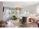 Inviting living room featuring neutral tones, ample natural light, and stylish decor at 1034 Scotch Bonnet Way, Summerville, SC 29485