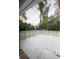 A spacious backyard deck surrounded by lush greenery, providing a serene outdoor space at 105 Dandridge Rd, Walterboro, SC 29488