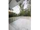 A spacious backyard deck surrounded by lush greenery, providing a serene outdoor space at 105 Dandridge Rd, Walterboro, SC 29488