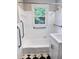 Bathroom featuring tiled tub/shower, grab bars, and a tiled floor at 105 Dandridge Rd, Walterboro, SC 29488