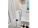 Bathroom featuring tiled tub/shower, grab bars, and a tiled floor at 105 Dandridge Rd, Walterboro, SC 29488