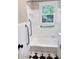 Bathroom featuring tiled tub/shower, grab bars, and a tiled floor at 105 Dandridge Rd, Walterboro, SC 29488