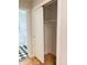 Open closet leading to tiled bathroom at 105 Dandridge Rd, Walterboro, SC 29488